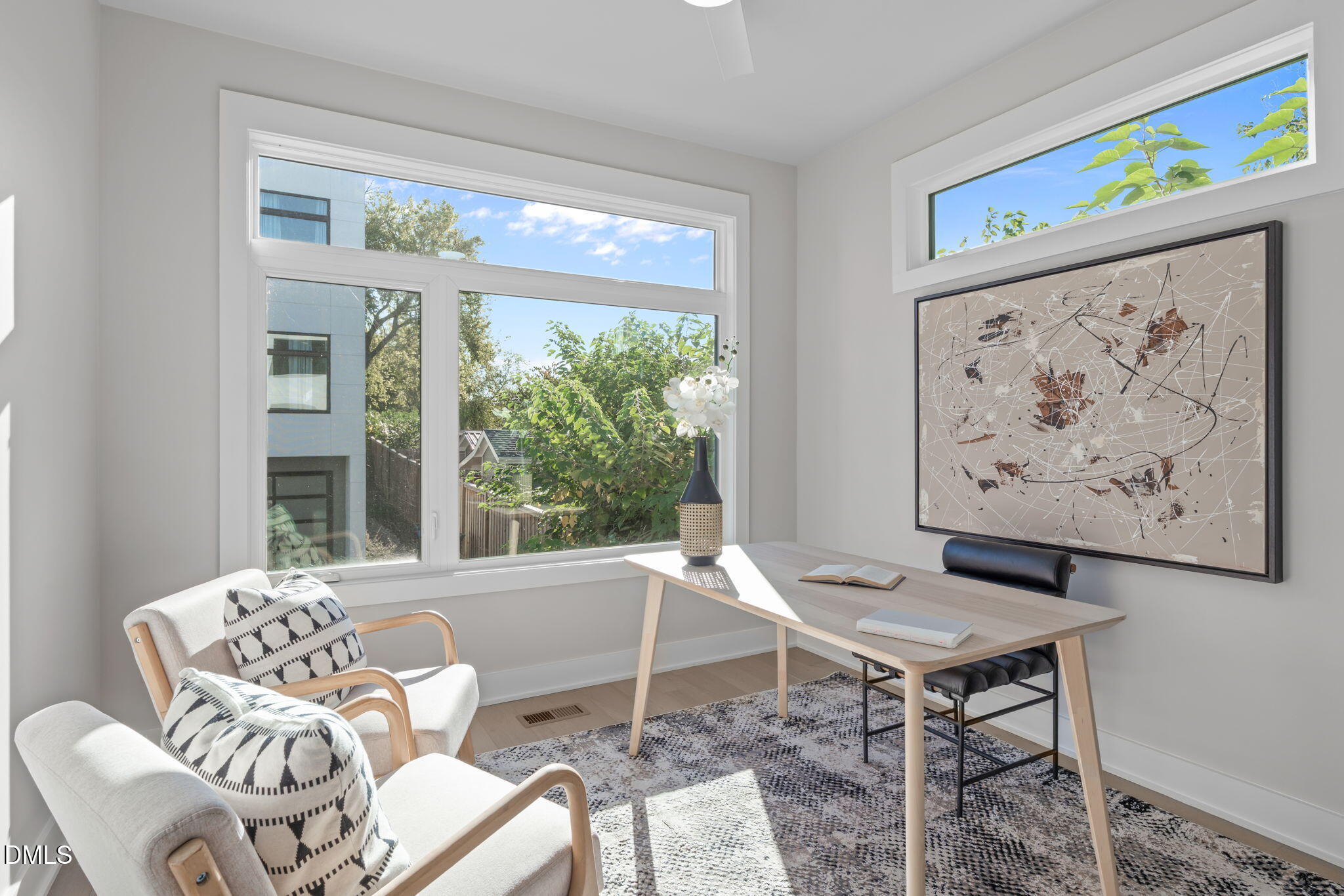 228 Woodsborough Place Raleigh, NC 27601 - Photo 17 of 59 a living room with furniture and a large window