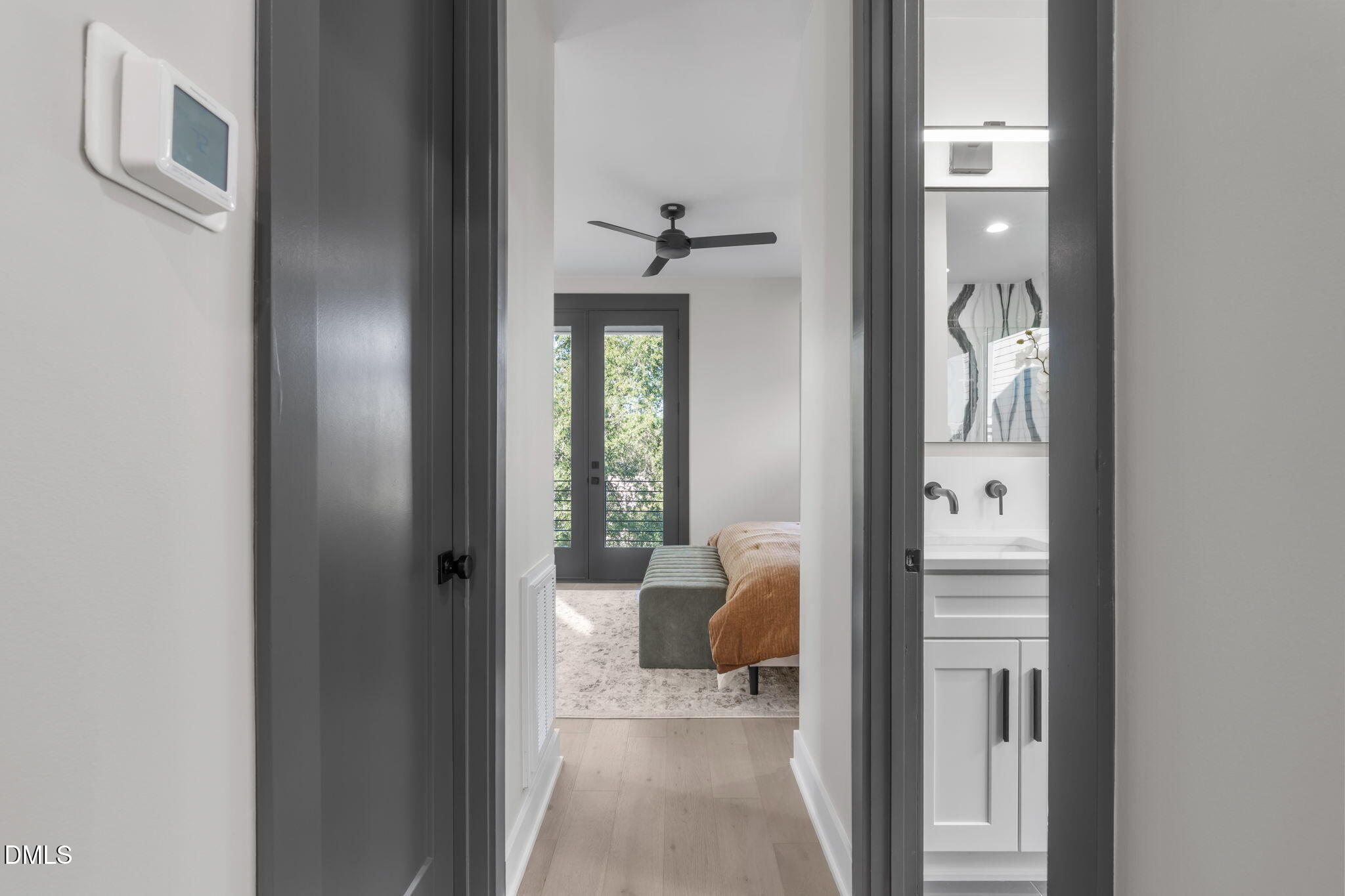 228 Woodsborough Place Raleigh, NC 27601 - Photo 23 of 59 a view of a hallway with a livingroom and a corridor
