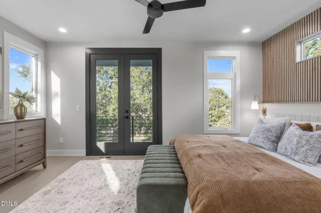 a bedroom with a bed and a walk in closet