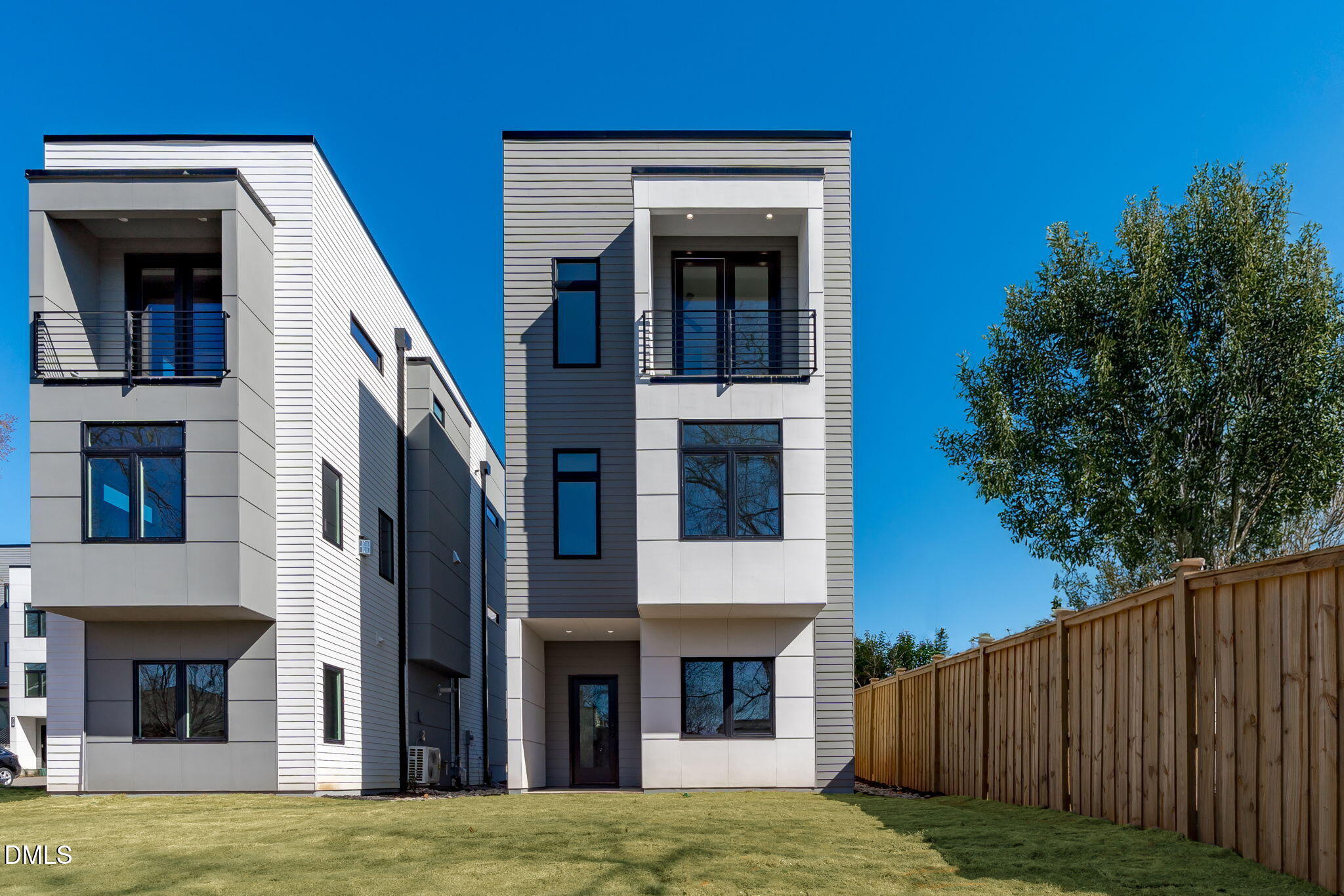 228 Woodsborough Place Raleigh, NC 27601 - Photo 43 of 59 a view of a house with a yard