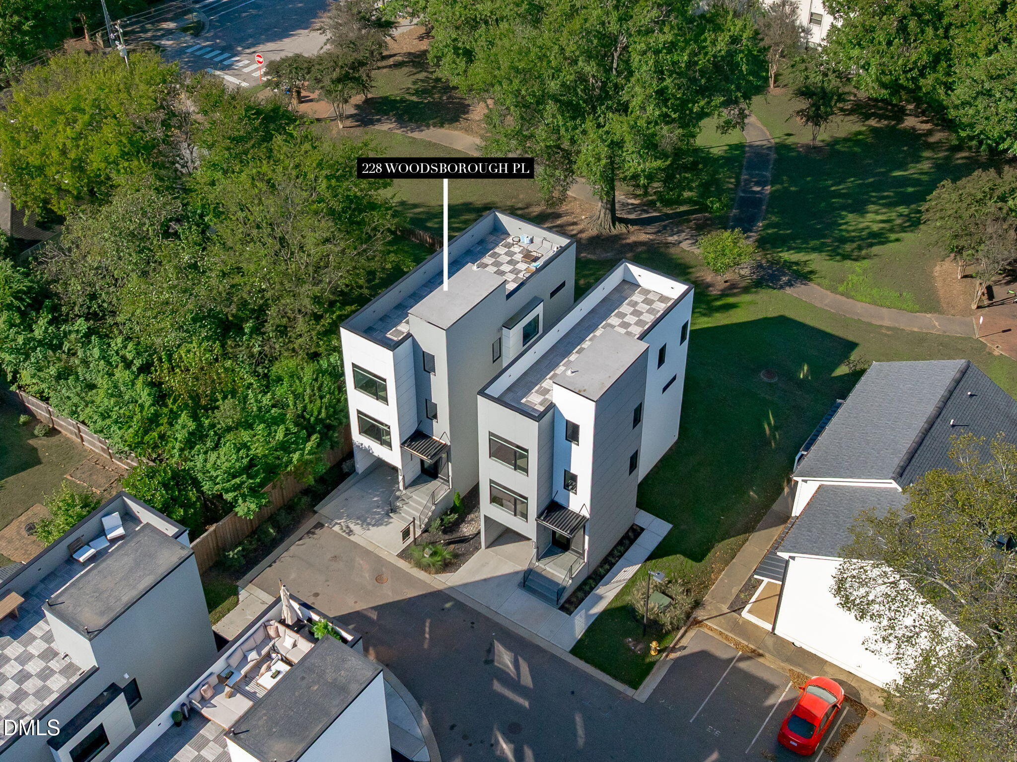 228 Woodsborough Place Raleigh, NC 27601 - Photo 45 of 59 an aerial view of a house with outdoor space