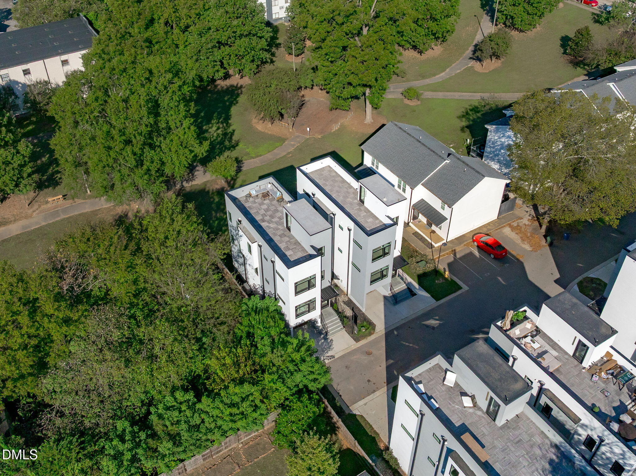 228 Woodsborough Place Raleigh, NC 27601 - Photo 49 of 59 an aerial view of a house with a yard