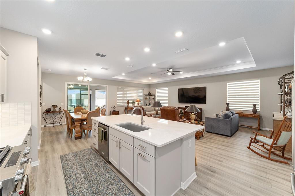 10691 Southwest 99th Place Ocala, FL 34481 - Photo 18 of 52 a view of living room with furniture and flat screen tv