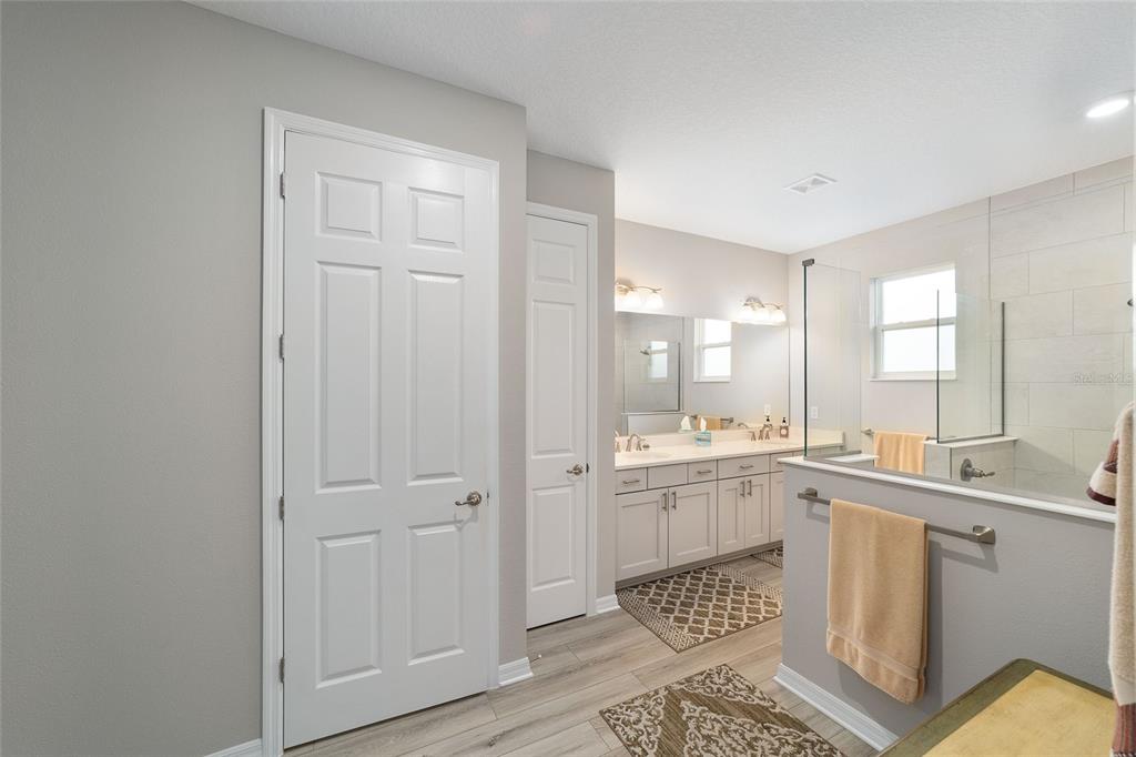 10691 Southwest 99th Place Ocala, FL 34481 - Photo 23 of 52 a room with a baby crib and a window