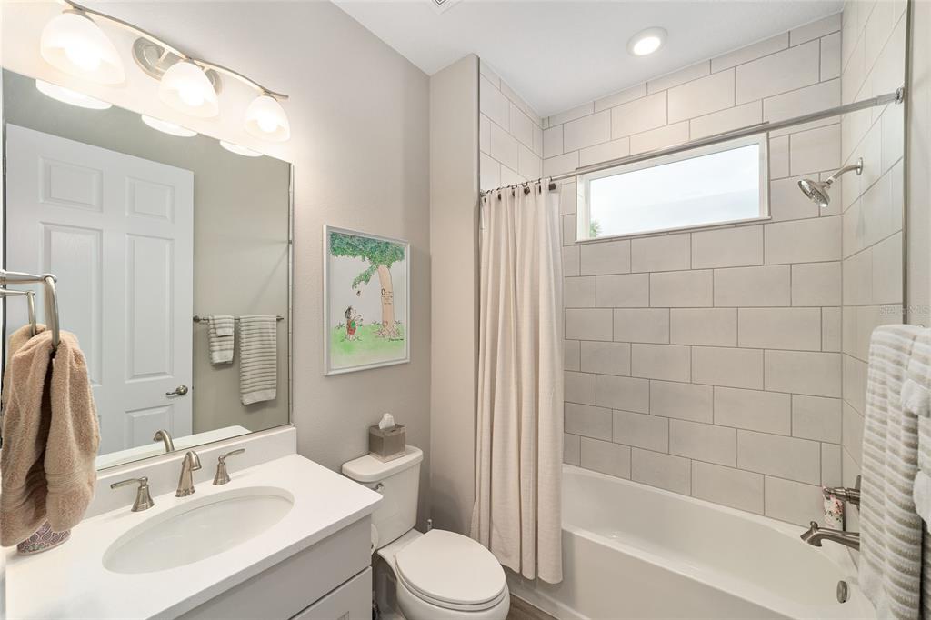 10691 Southwest 99th Place Ocala, FL 34481 - Photo 29 of 52 a bathroom with a sink toilet and shower