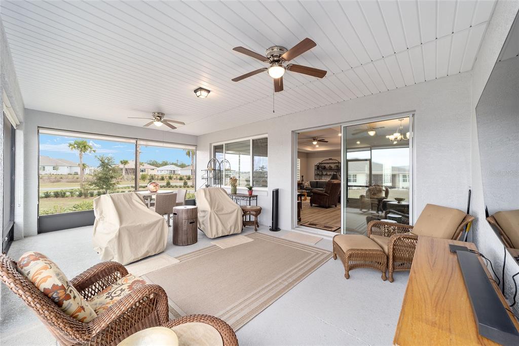 10691 Southwest 99th Place Ocala, FL 34481 - Photo 34 of 52 a living room with furniture and a large window