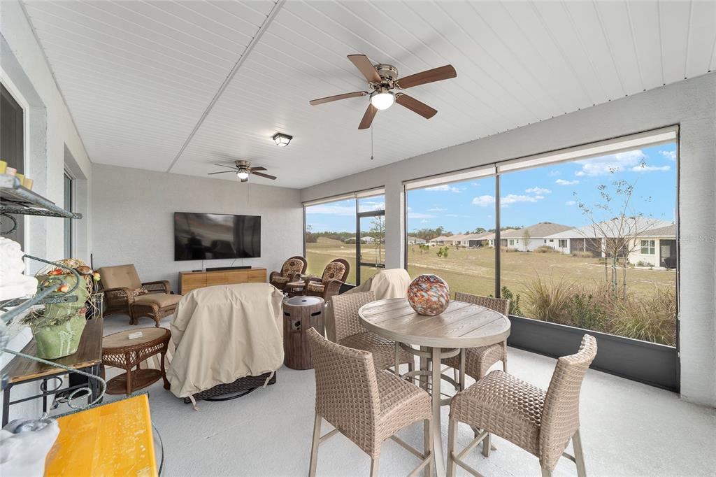 10691 Southwest 99th Place Ocala, FL 34481 - Photo 36 of 52 a view of a dining room with furniture window and outside view