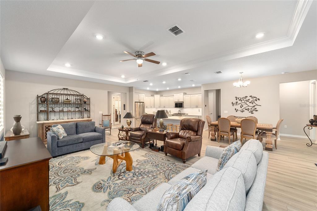 10691 Southwest 99th Place Ocala, FL 34481 - Photo 10 of 52 a living room with furniture and a large window