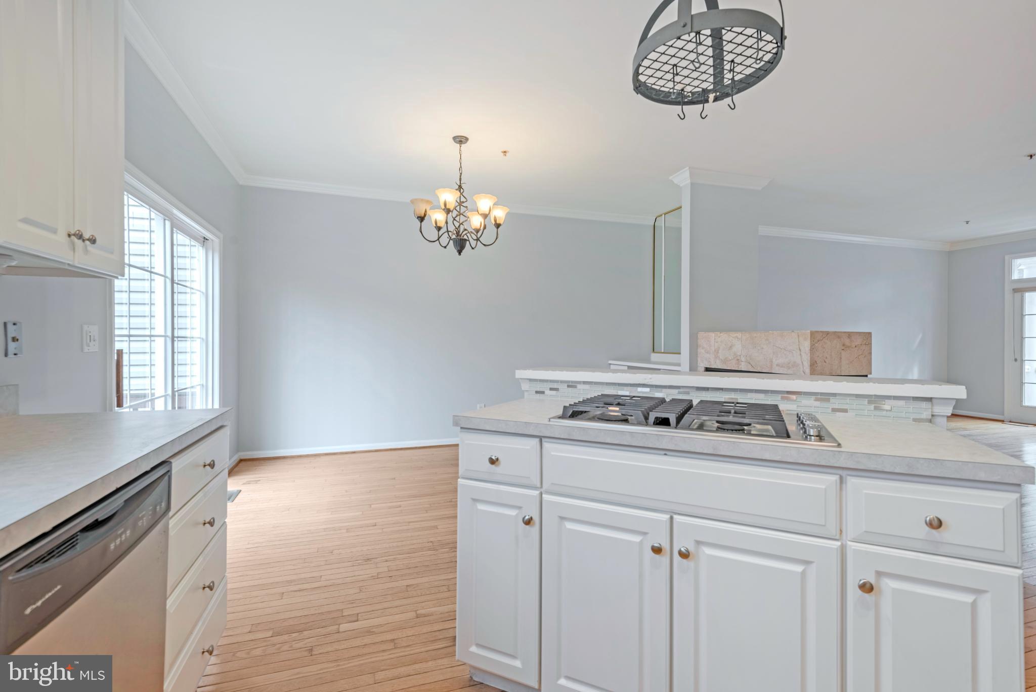 226 Wintergull Lane Annapolis, MD 21409 - Photo 13 of 38 a bathroom with a sink a mirror and a window
