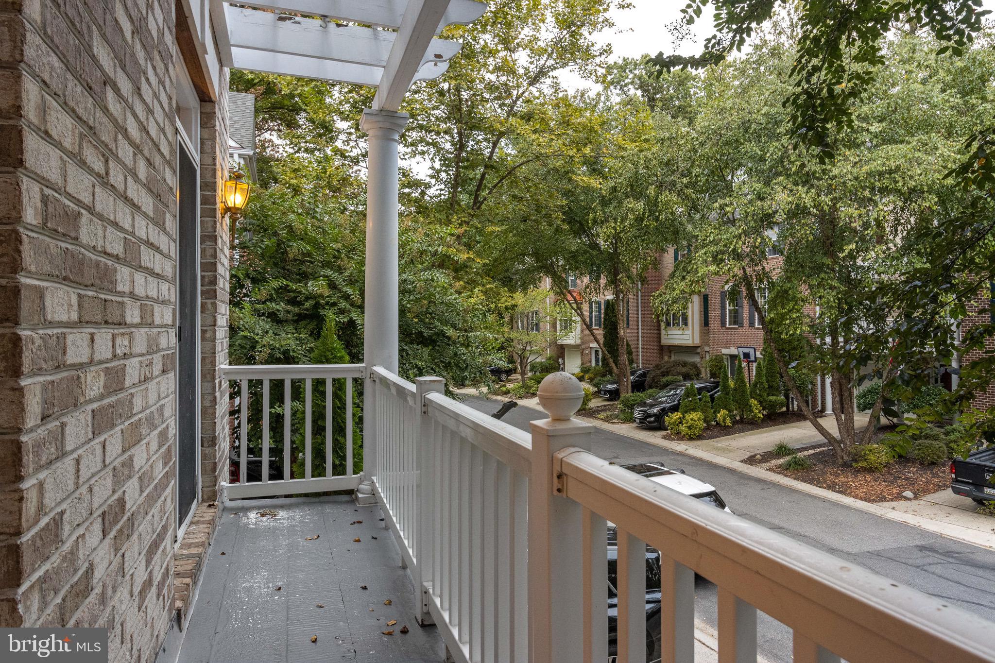 226 Wintergull Lane Annapolis, MD 21409 - Photo 19 of 38 a view of a balcony with wooden floor