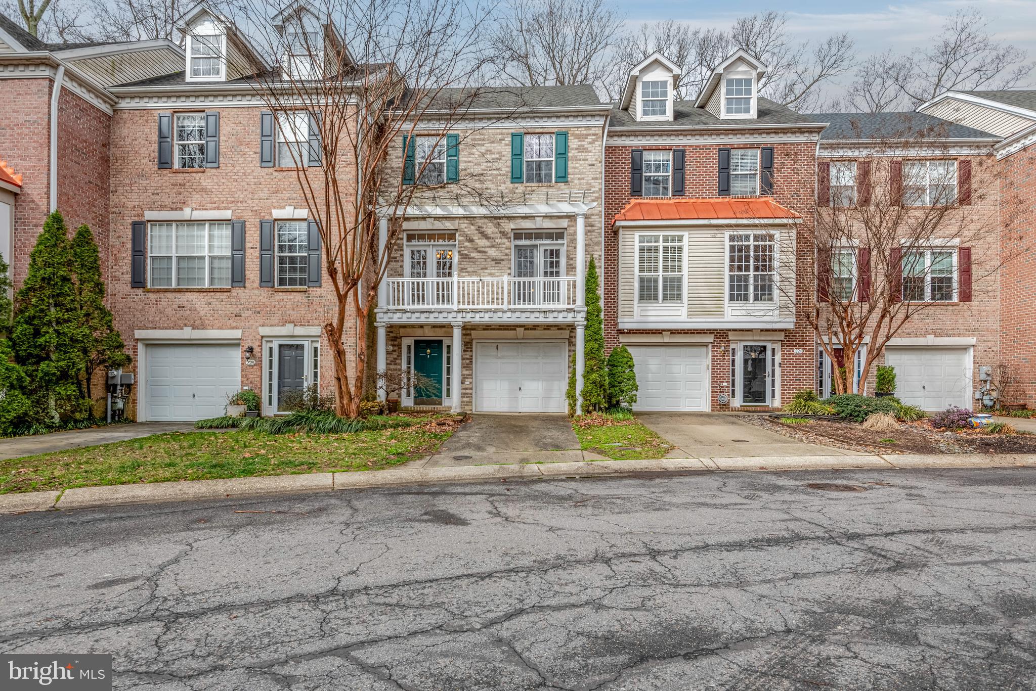226 Wintergull Lane Annapolis, MD 21409 - Photo 2 of 38 front view of a brick house with a yard