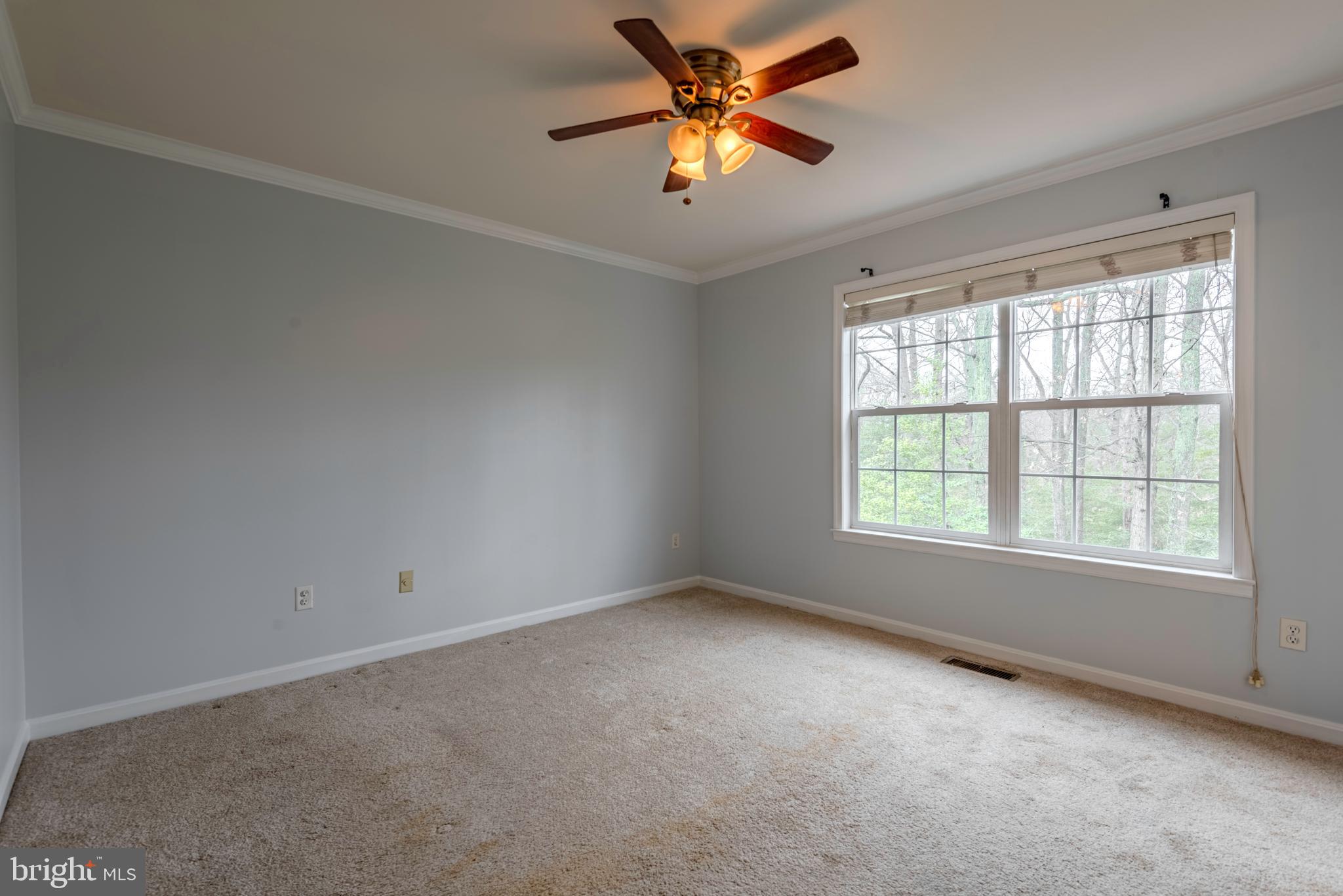 226 Wintergull Lane Annapolis, MD 21409 - Photo 20 of 38 an empty room with a window and a fan