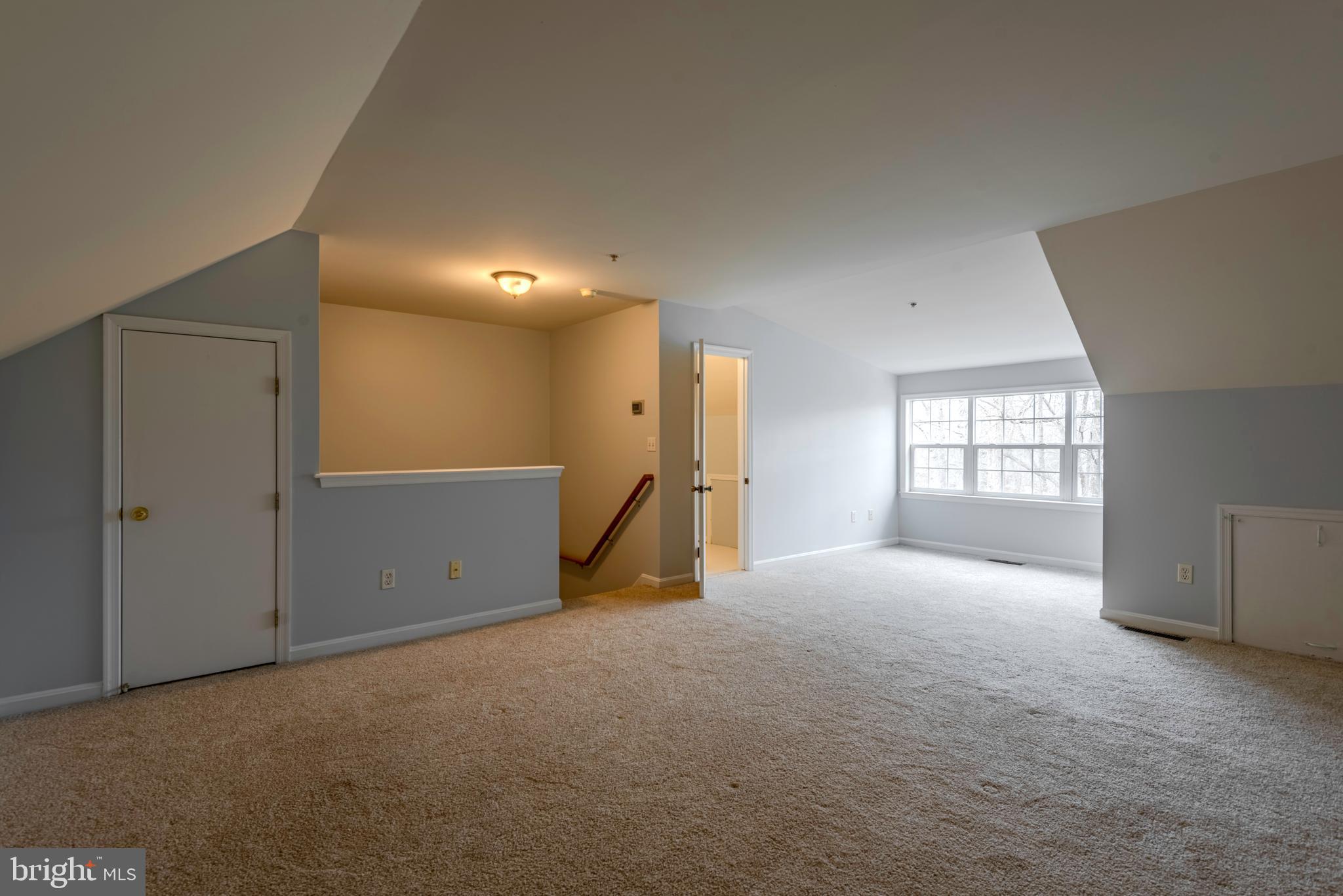 226 Wintergull Lane Annapolis, MD 21409 - Photo 30 of 38 a view of an empty room with a window