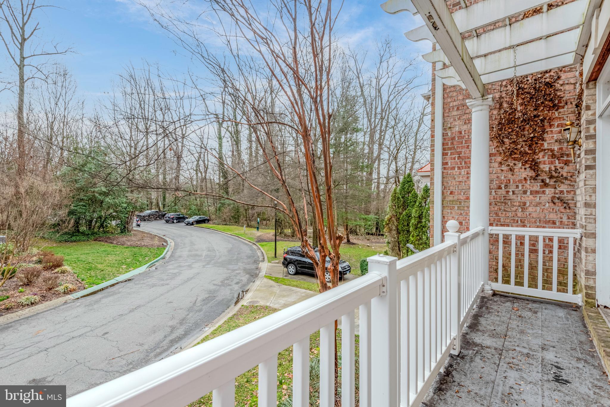 226 Wintergull Lane Annapolis, MD 21409 - Photo 34 of 38 a view of a street with wooden fence