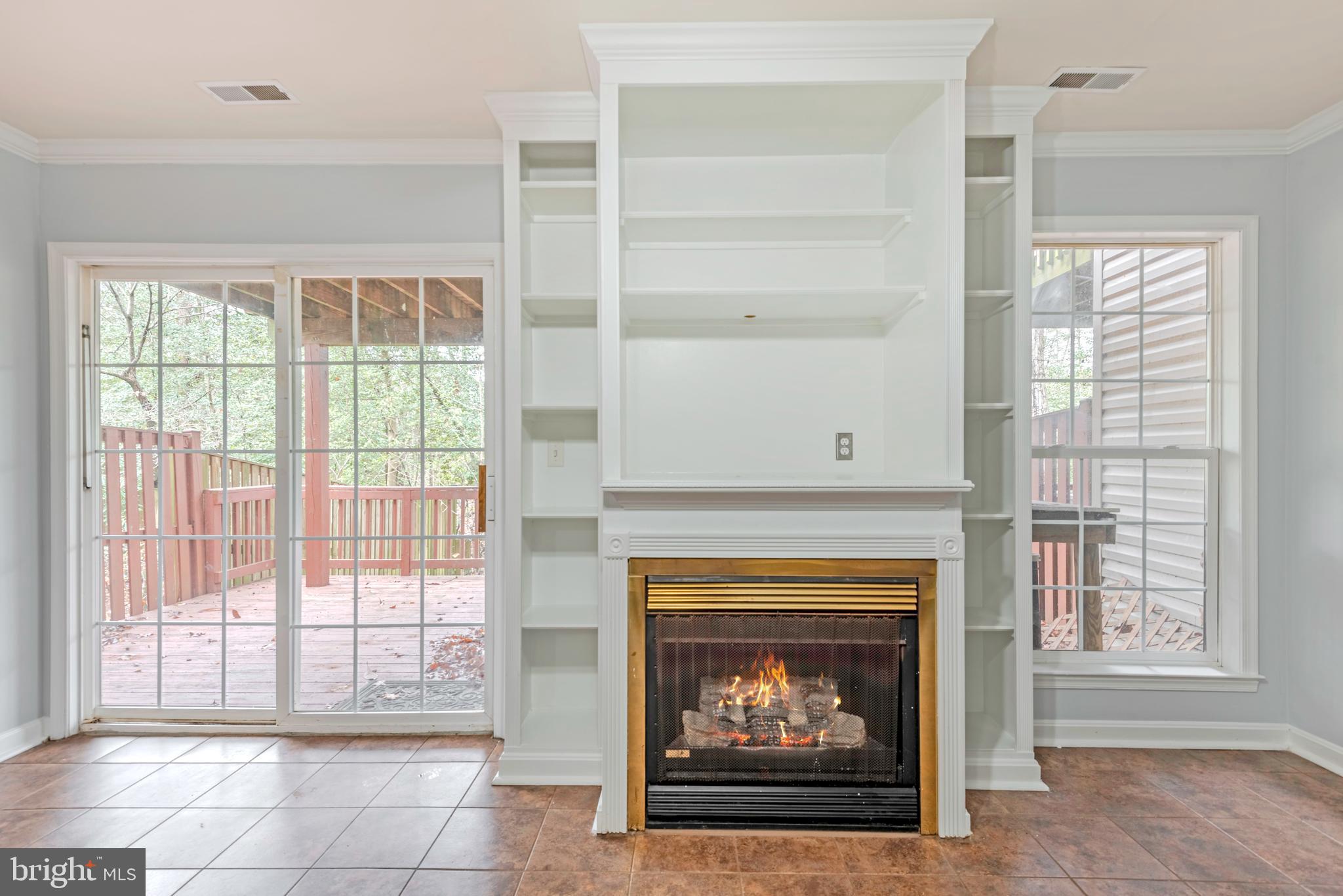 226 Wintergull Lane Annapolis, MD 21409 - Photo 5 of 38 a living room with a fireplace