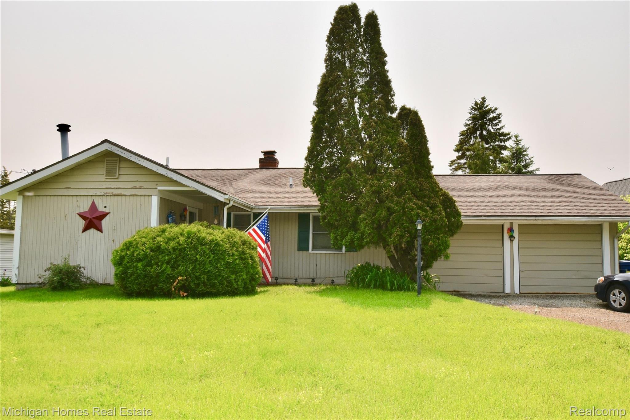 10466 Runyan Lake Road Fenton, MI 48430 - Photo 15 of 17 road front of 10466 Runyan Lake Road