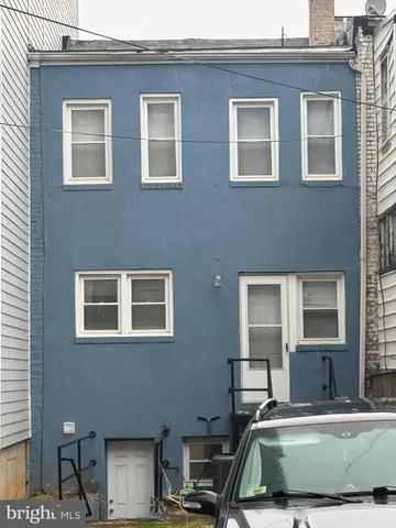 a car parked in front of a building