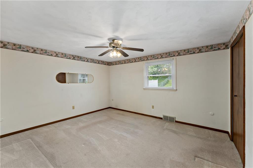 27 Dover Road Irwin, PA 15642 - Photo 14 of 43 a view of an empty room