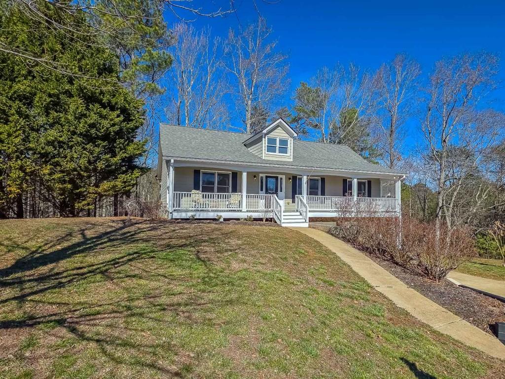 165 Horseshoe Bend Jasper, GA 30143 - Photo 4 of 44 a front view of a house with a yard