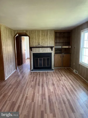wooden floor and fireplace in a room