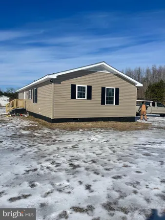 a house view with a backyard space