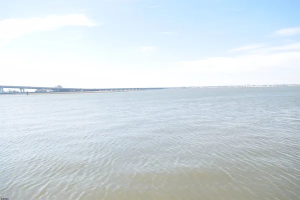 a view of beach and lake