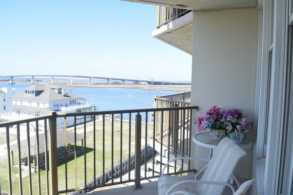 a view of a balcony with an ocean view