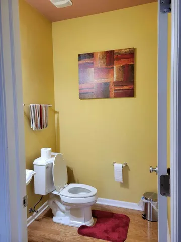 a bathroom with a toilet and a sink