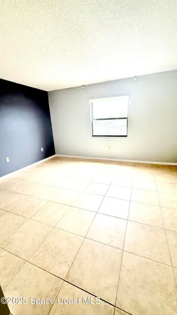 a view of a room with an empty space