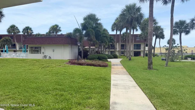 a house view with a garden space