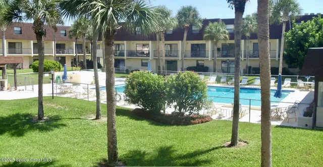 a house view with a garden space