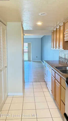 a large bathroom with a sink and a mirror