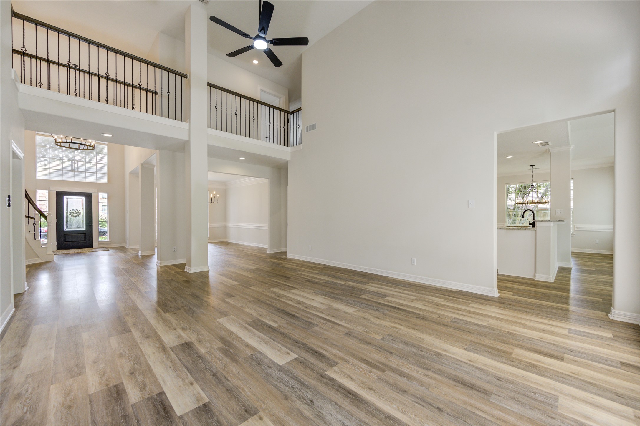 17318 Bonnard Circle Spring, TX 77379 - Photo 45 of 45 The upstairs walkway overlooks the formal living room. The upstairs is a split floor plan with 2 bedrooms left and 2 bedrooms right, connected by this breezeway. (5 bedrooms total)