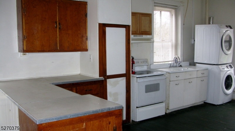 191 Mt Joy Road Phillipsburg, NJ 08865 - Photo 17 of 29 a kitchen with a refrigerator sink and cabinets