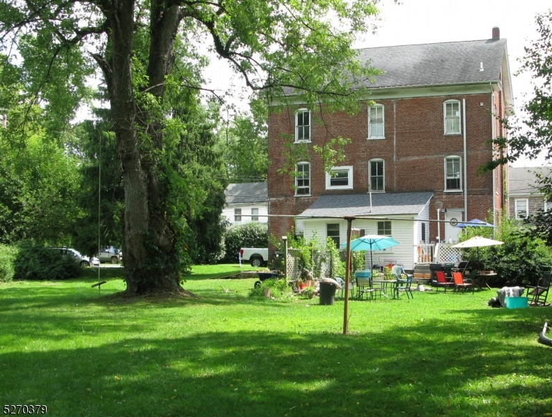 191 Mt Joy Road Phillipsburg, NJ 08865 - Photo 25 of 29 a view of an house with backyard and a tree
