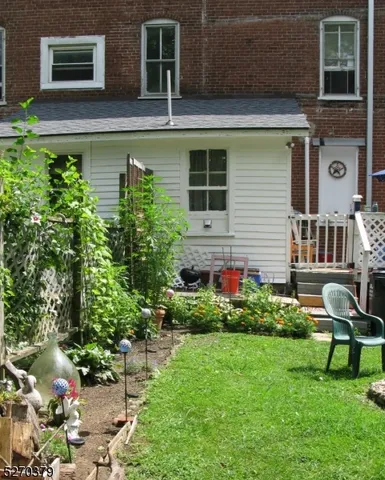 a house view with a garden space