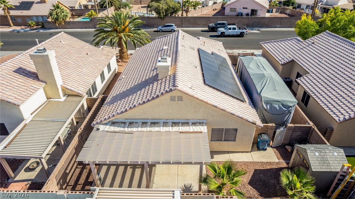 5112 West Camino Del Rancho Las Vegas, NV 89130 - Photo 36 of 44 An aerial perspective reveals the structure's distinct roofline and outdoor living spaces.
