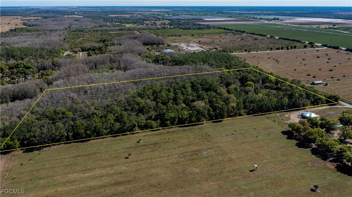 850 G Road LaBelle, FL 33935 - Photo 21 of 24 an aerial view of a house with a yard