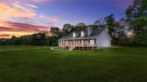 a view of a house with a big yard