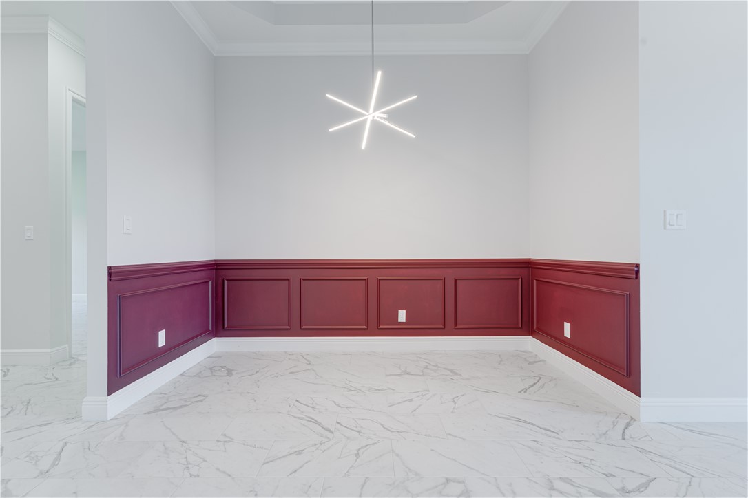 1805 Bridgepointe Circle, Unit 2 Vero Beach, FL 32967 - Photo 8 of 28 a kitchen with a cabinet and cabinets