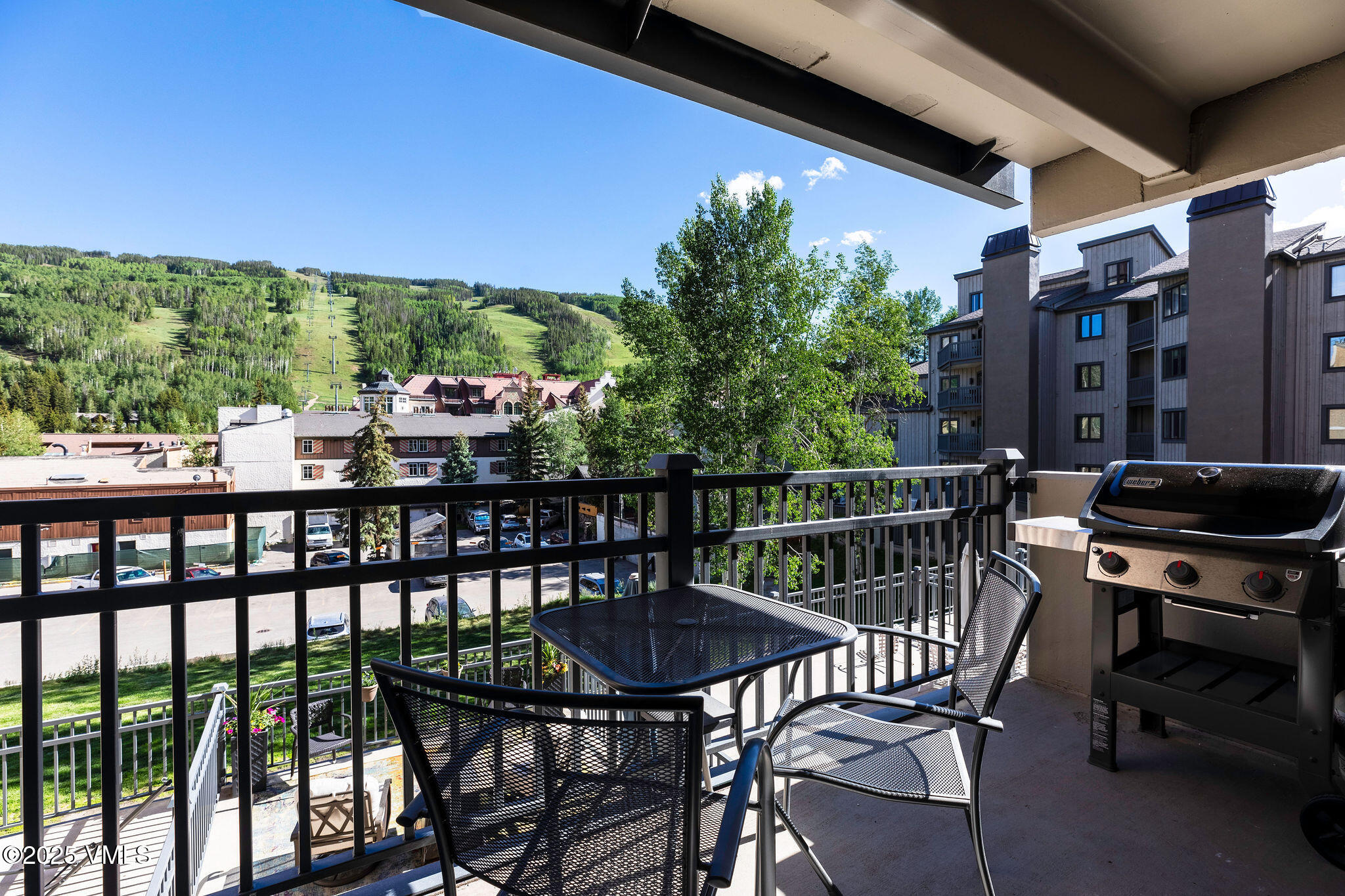 508 East Lionshead Circle, Unit 214 Vail, CO 81657 - Photo 2 of 9 a view of a balcony with chairs