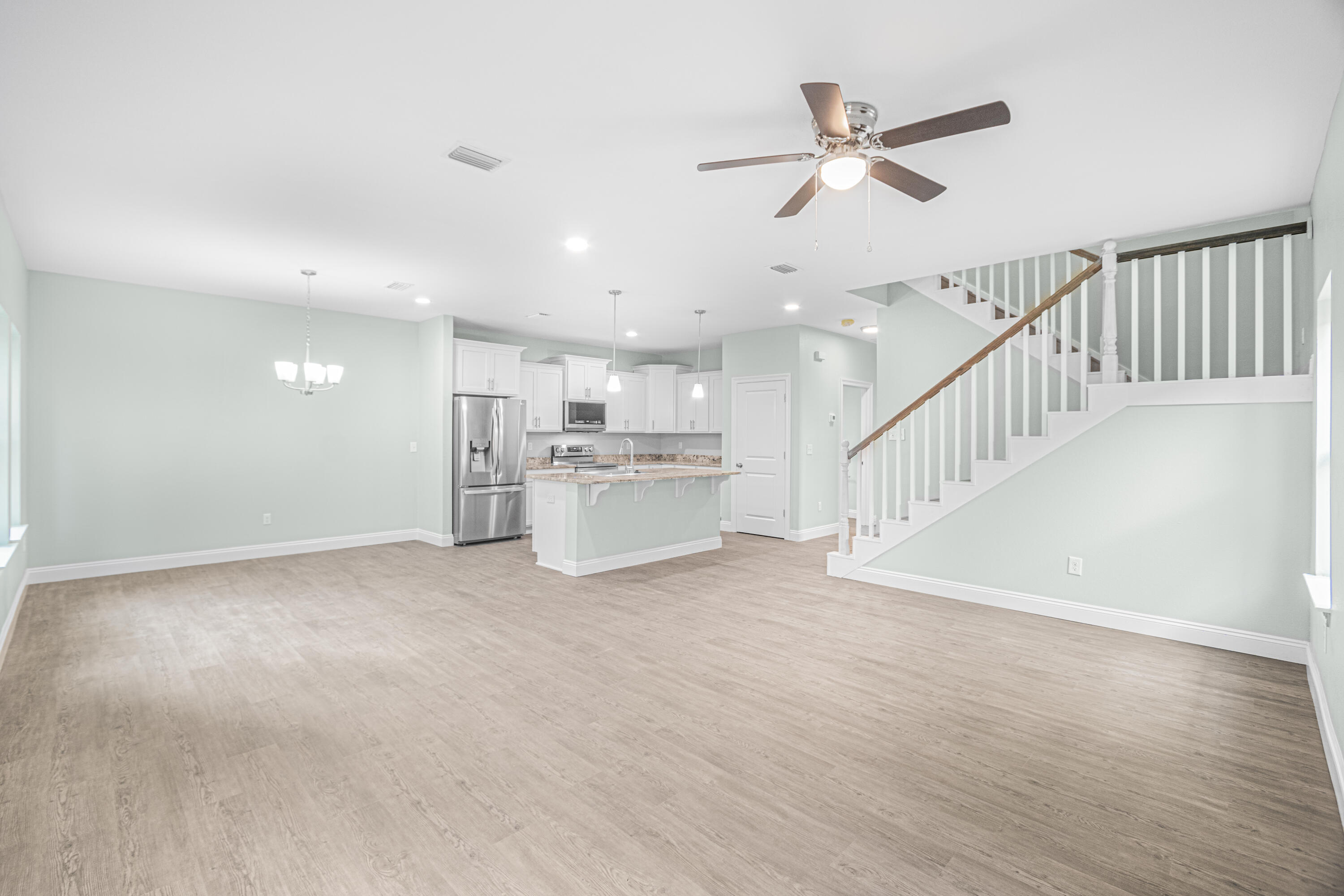 169 Johnson Court Crestview, FL 32536 - Photo 13 of 30 a view of kitchen with wooden floor and electronic appliances