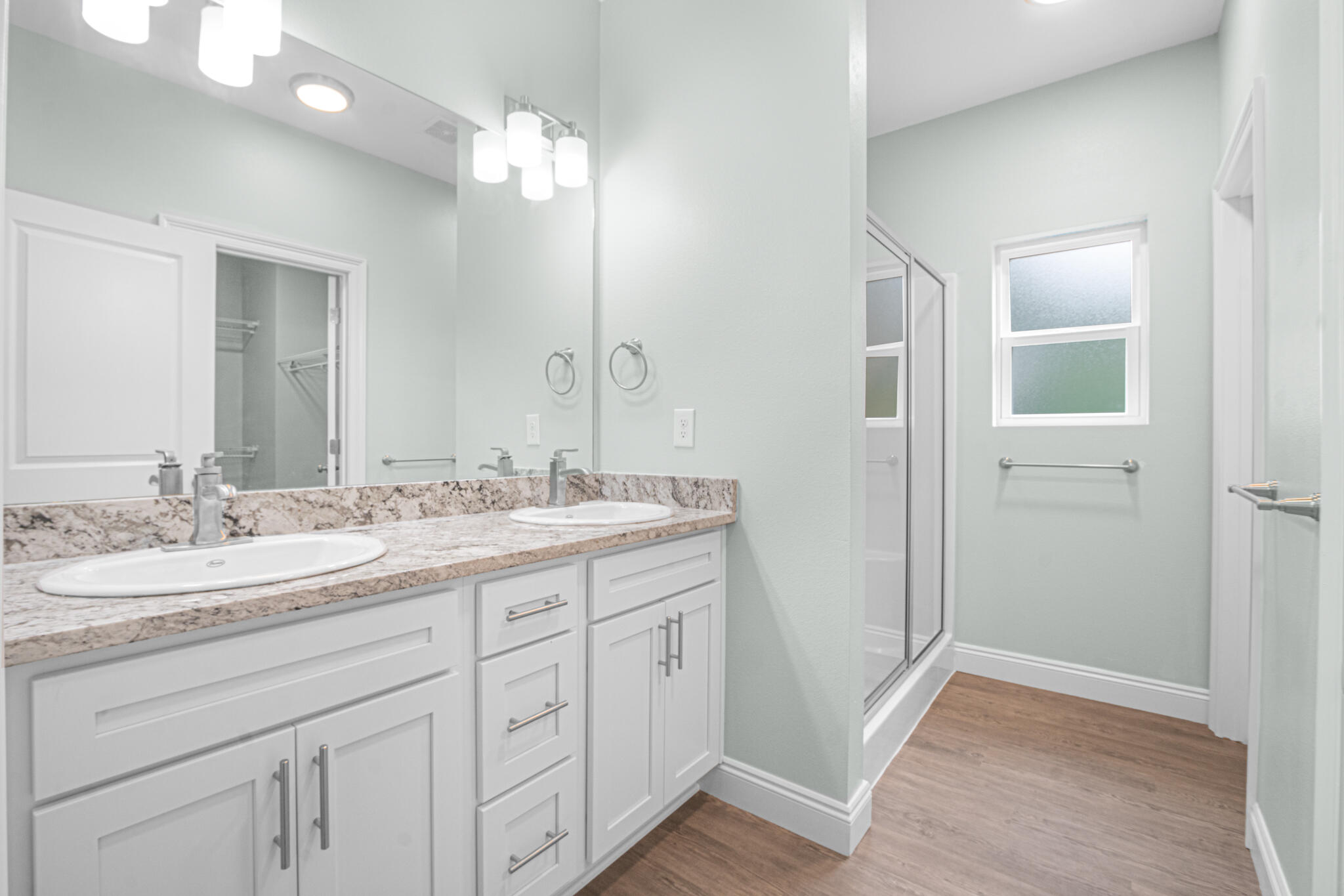 169 Johnson Court Crestview, FL 32536 - Photo 19 of 30 a bathroom with a double vanity sink and a mirror