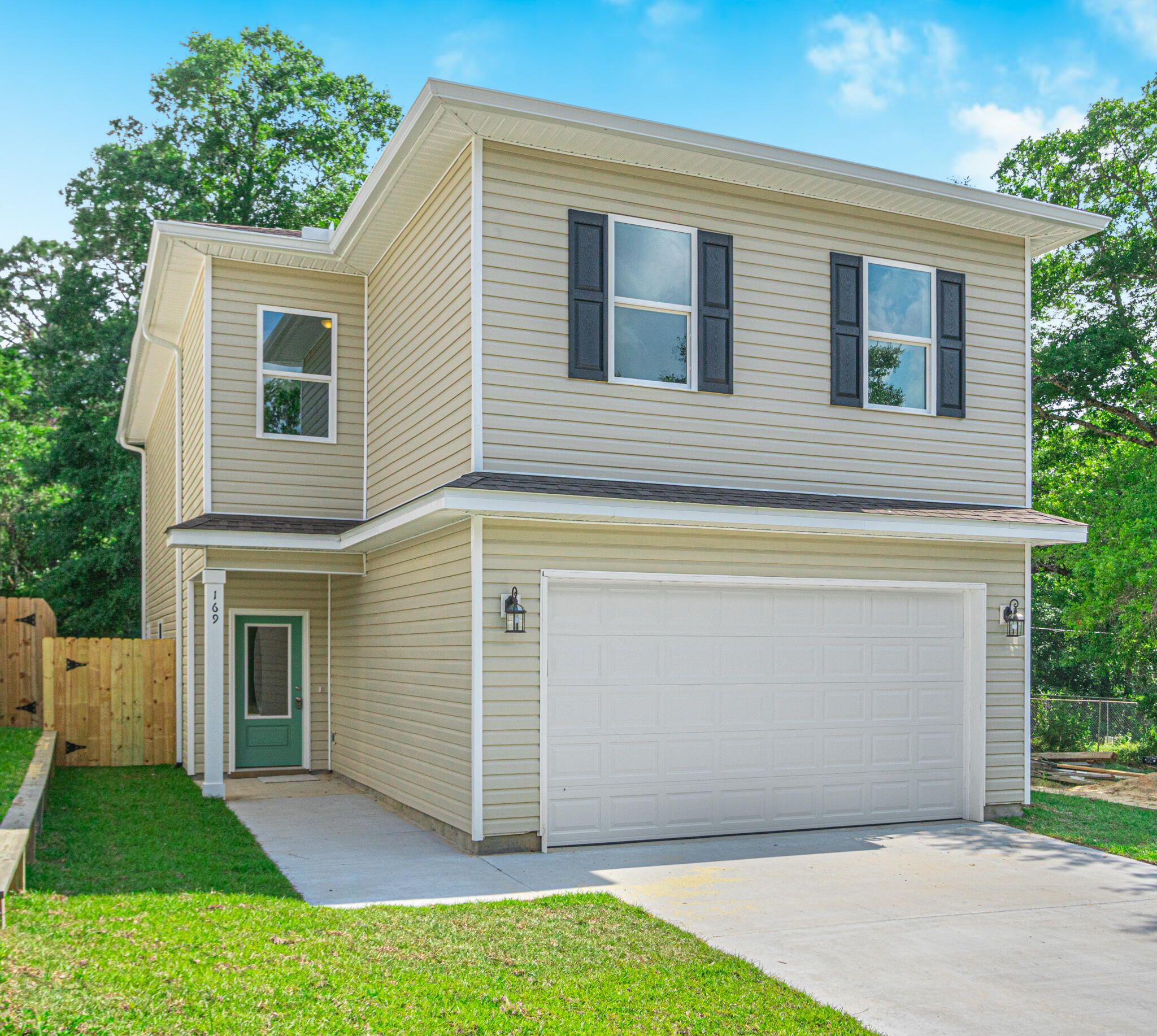 169 Johnson Court Crestview, FL 32536 - Photo 2 of 30 a front view of a house with a yard
