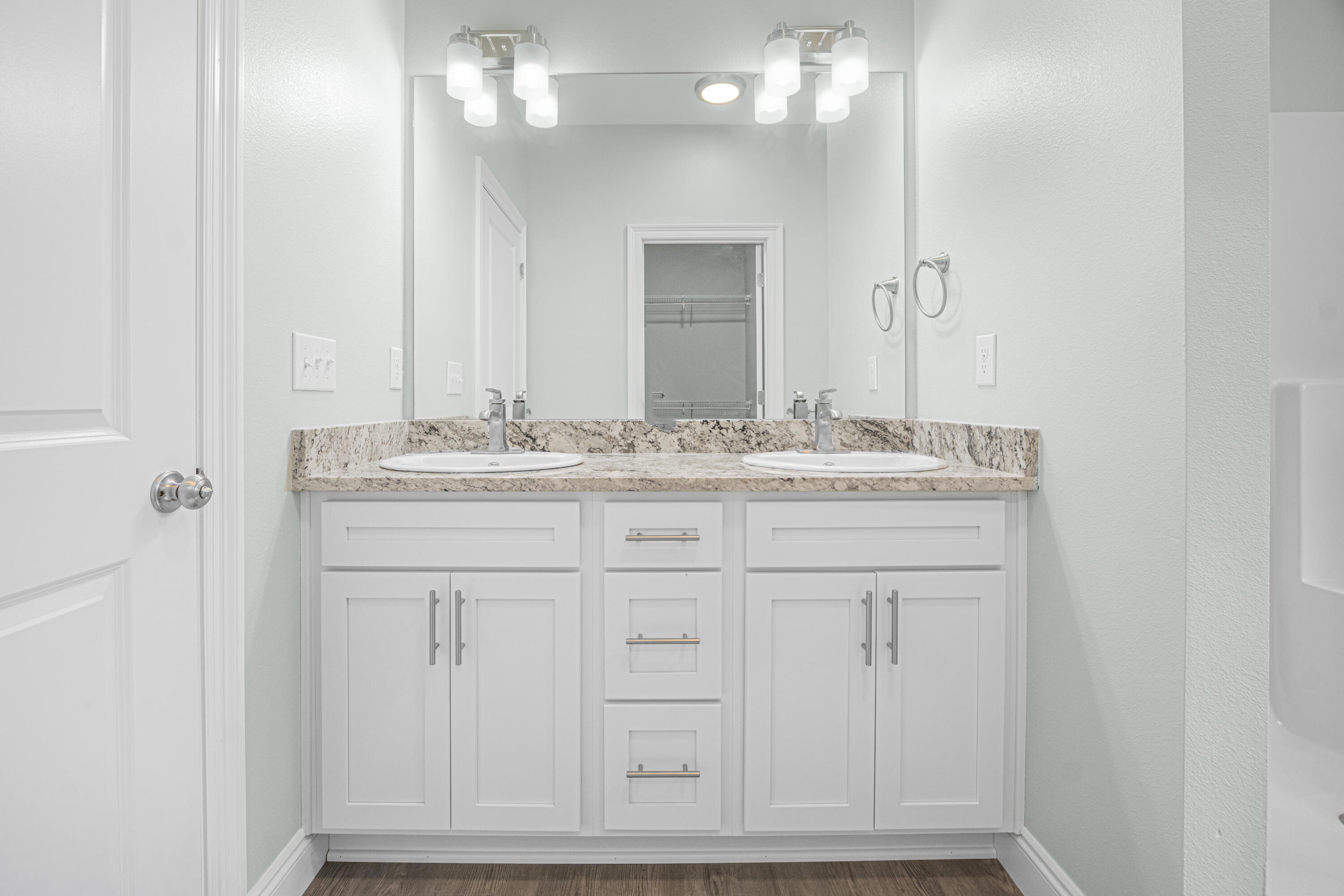 169 Johnson Court Crestview, FL 32536 - Photo 21 of 30 a bathroom with a sink vanity and mirror