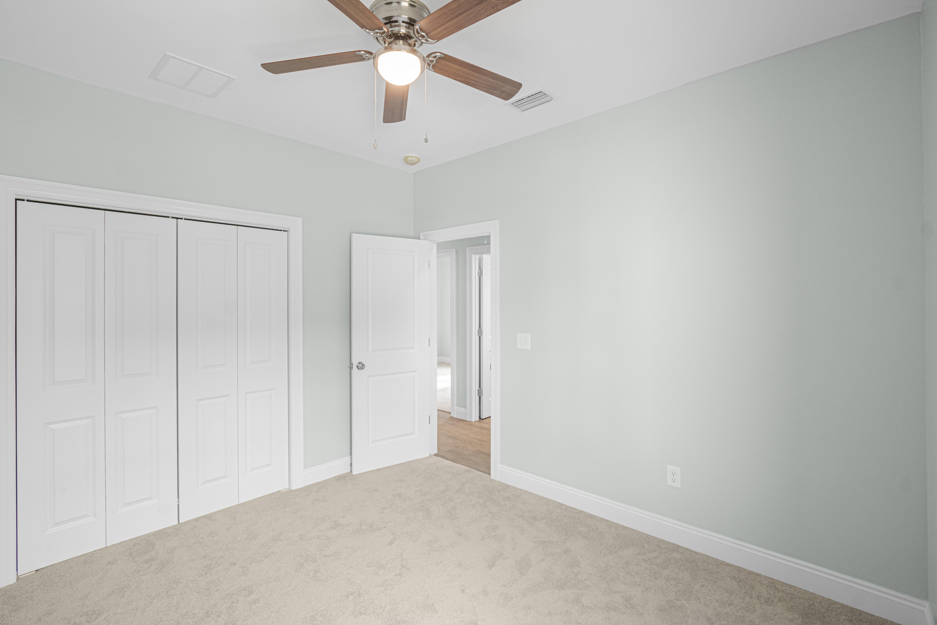 169 Johnson Court Crestview, FL 32536 - Photo 27 of 30 wooden floor in an empty room