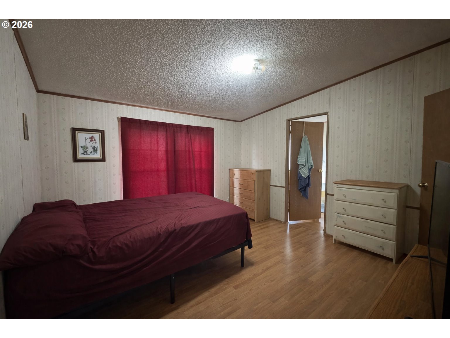 701 2nd Street Cove, OR 97824 - Photo 7 of 13 a living room with furniture and a closet