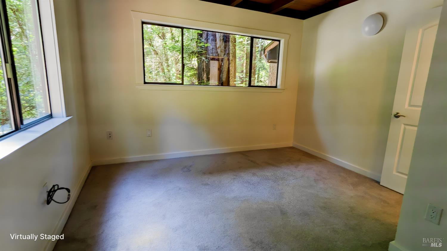 14911 Canyon 7 Road Guerneville, CA 95446 - Photo 16 of 32 a view of an empty room with a window