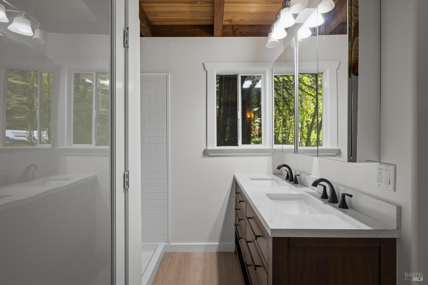 14911 Canyon 7 Road Guerneville, CA 95446 - Photo 21 of 32 a bathroom with a sink and a mirror