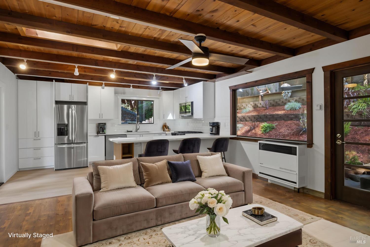 14911 Canyon 7 Road Guerneville, CA 95446 - Photo 6 of 32 a living room with furniture and a large window
